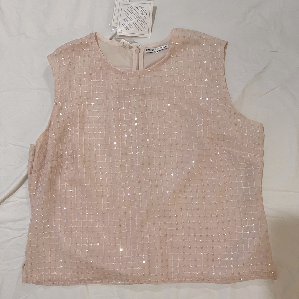 Pink sleeveless top from Camille Morgan